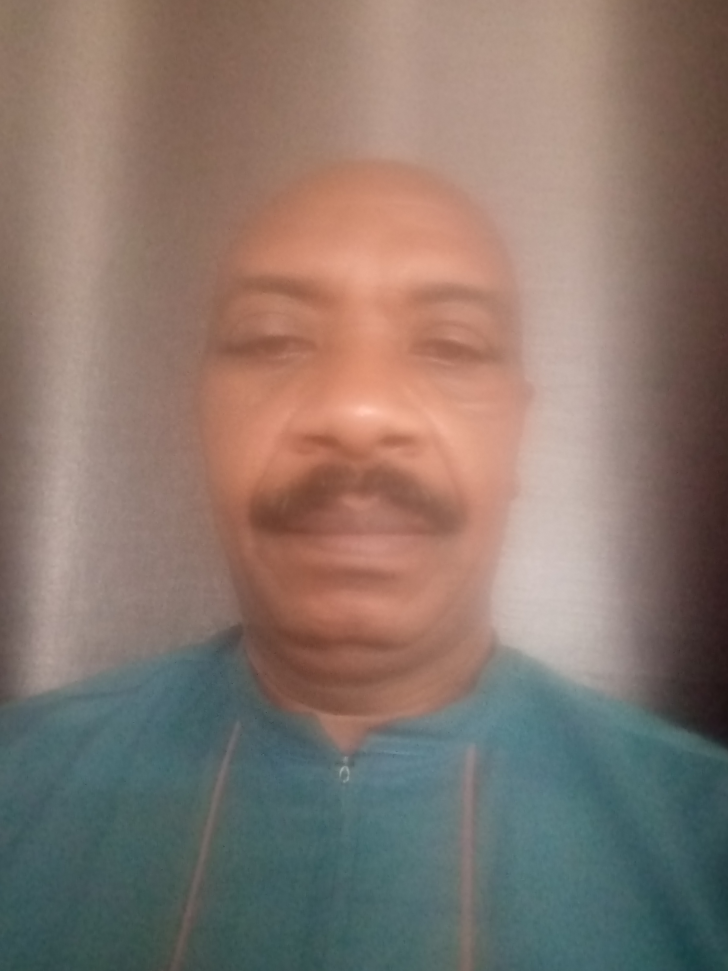 Dr. TUMUSHERURE Wilson